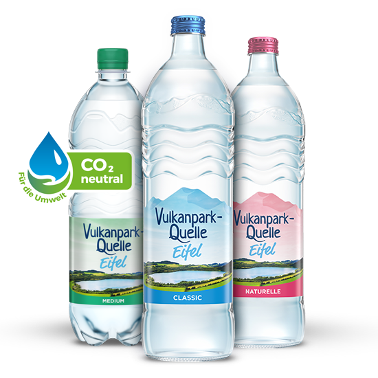 3 bottles of Vulkanpark-Quelle Eifel with different labels and in different colours stand next to each other.