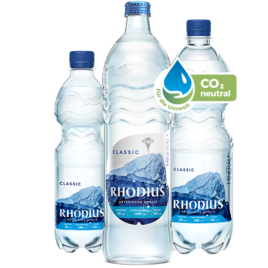 3 bottles of RHODIUS mineral water in different bottles.
